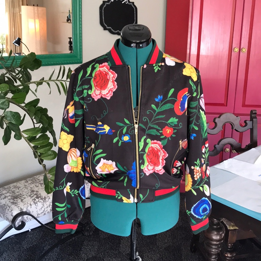 Floral satin baseball style jacket.